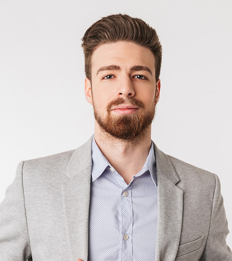 portrait-of-a-confident-young-man-dressed-in-shirt-P4DTYKC.jpg